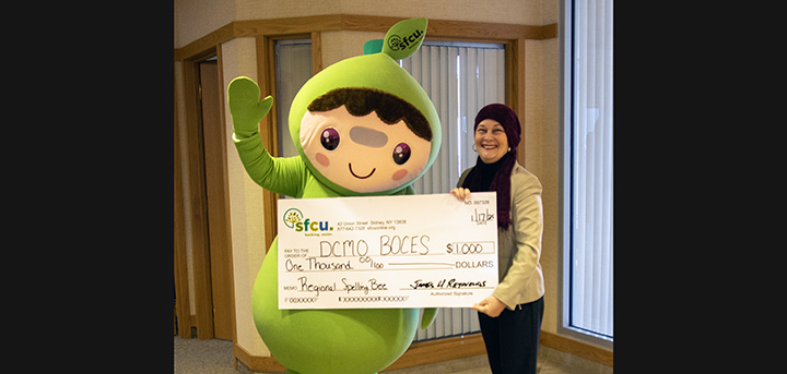 Regional Spelling Bee receives donation from SFCU